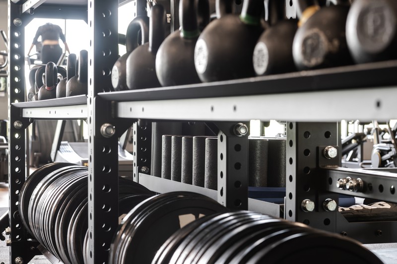 Gym Shelf with Strength Training Equipment. Gym Shelf with Strength Training Equipment.